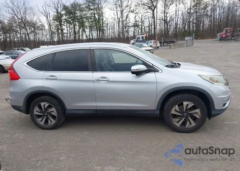 2016 Honda Cr-V Touring z USA, uszkodzony, nr VIN 5J6RM4H90GL067898